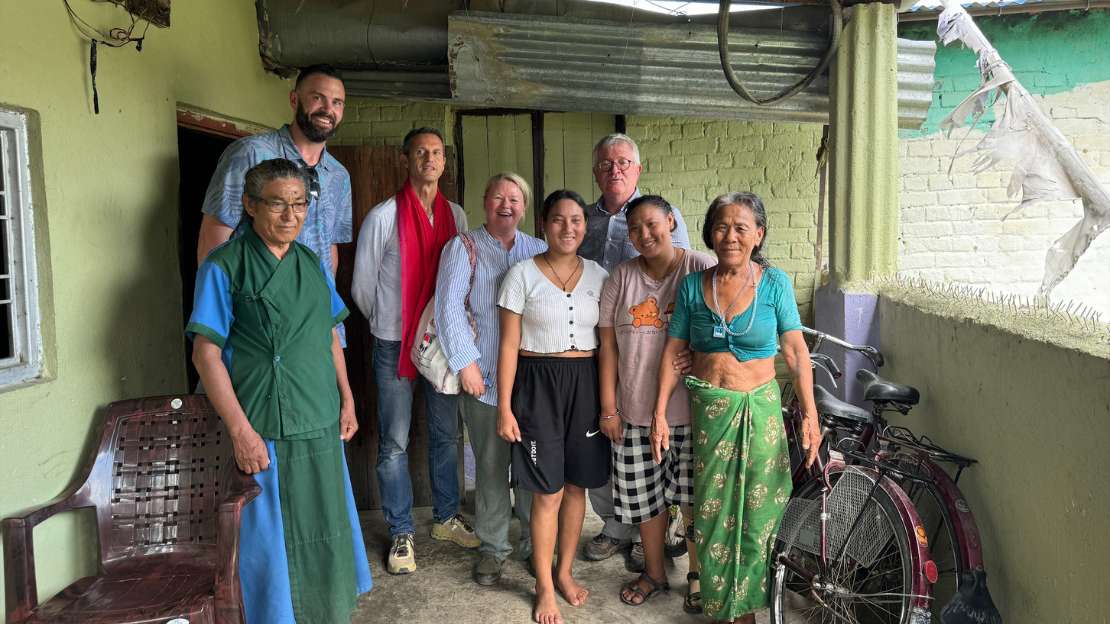 A group of people pose for a photo