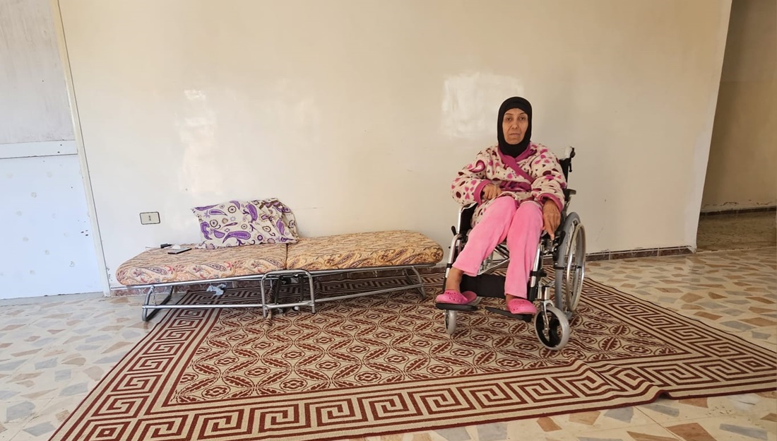 Hayat in her new home with a wheelchair adapted to her disability. 