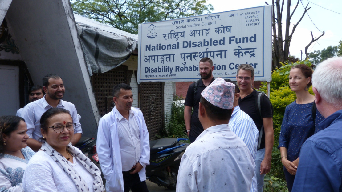 Board Member Joe O'Meara in Nepal with other HI staff at the Disability Rehabilitation Center