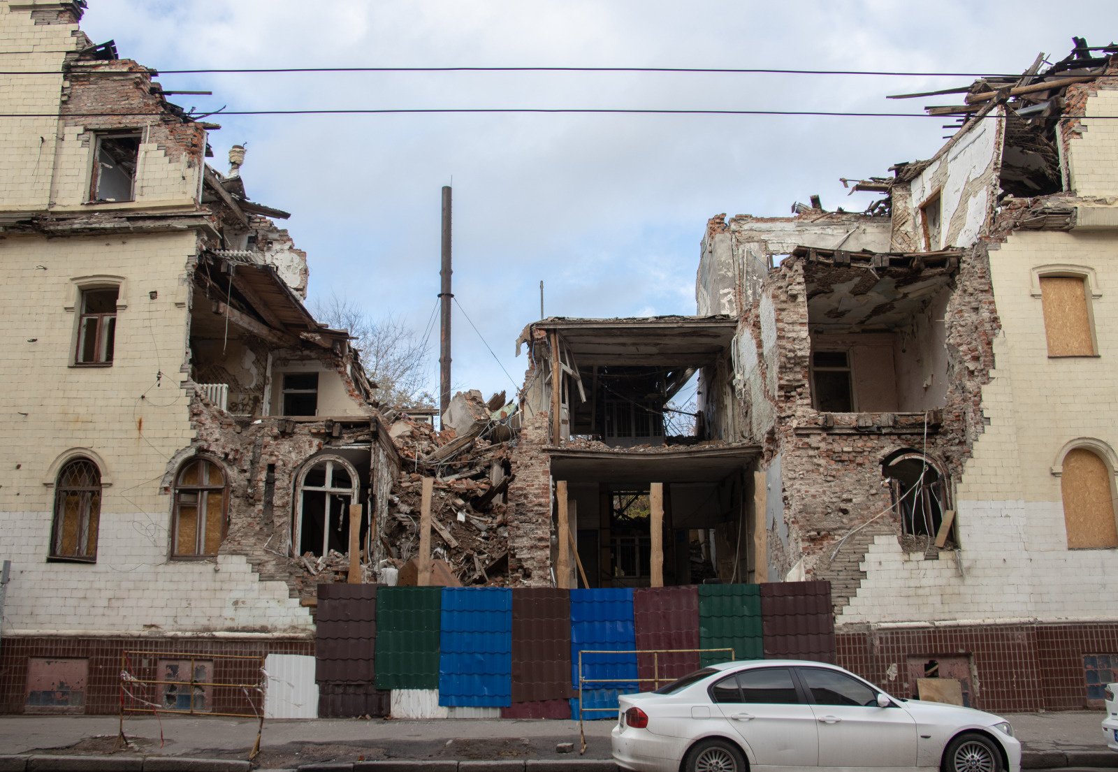 A destroyed building near a road